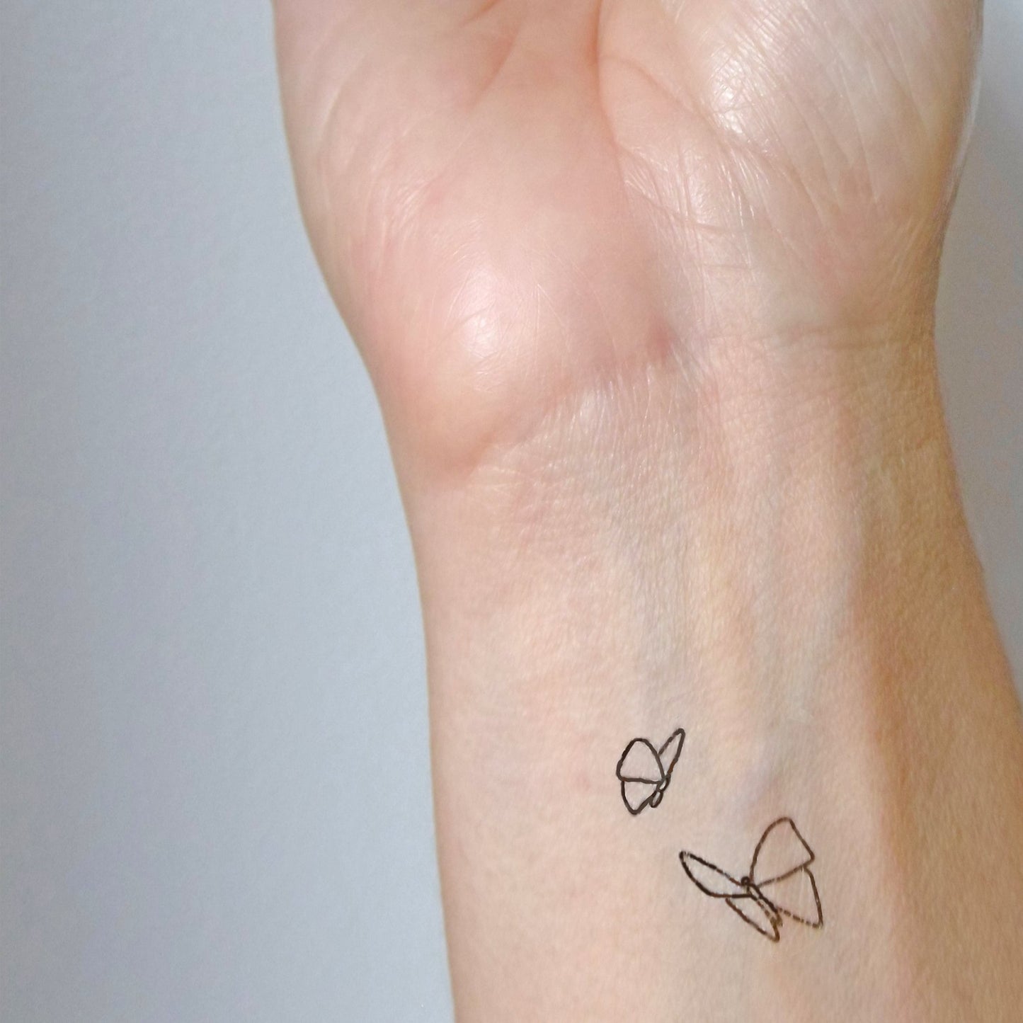 tatouage temporaire vol de papillons (9 sets de 2 papillons)