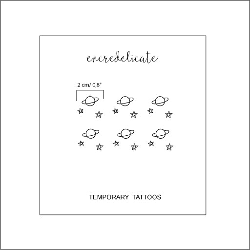 tatouage temporaire minimaliste de Saturne et de mini étoiles