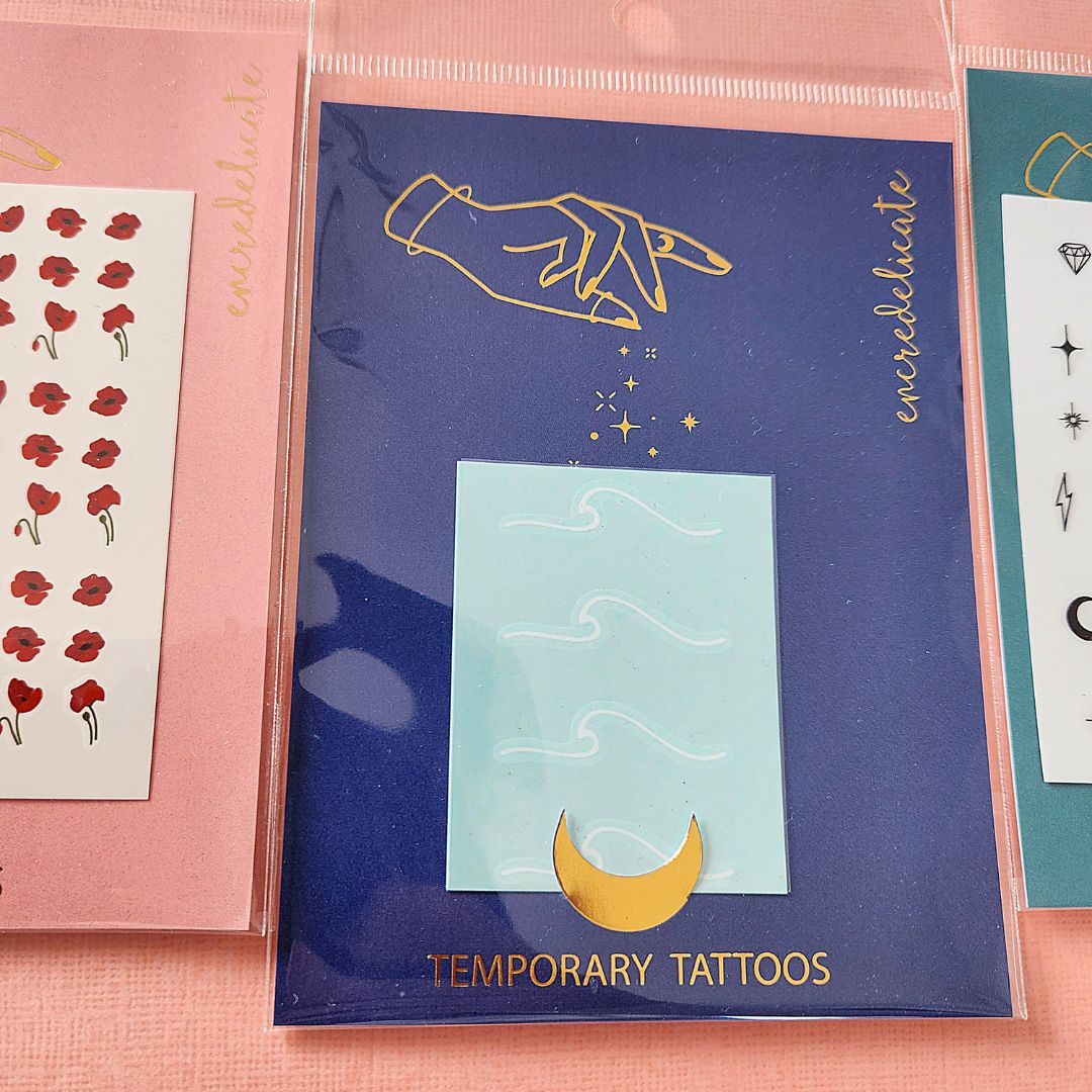 tatouages temporaires blancs vague minimaliste (set de 4)